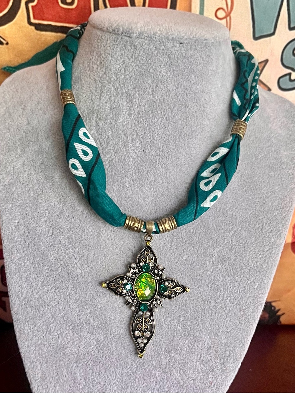 Teal Fabric Necklace with Green Crystal Cross Pendant